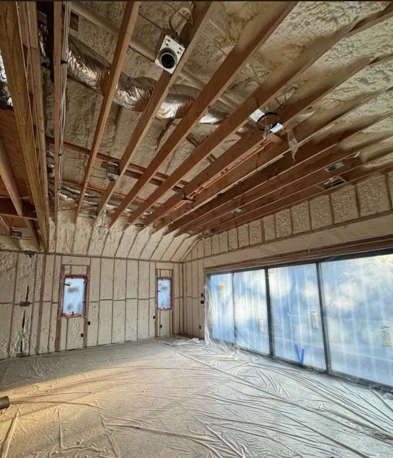 Interior walls and ceiling insulated with spray foam during new construction in Tucson